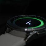 Close-up of a smartwatch with fitness tracking display, ideal for outdoor and trekking use