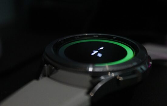 Close-up of a smartwatch with fitness tracking display, ideal for outdoor and trekking use