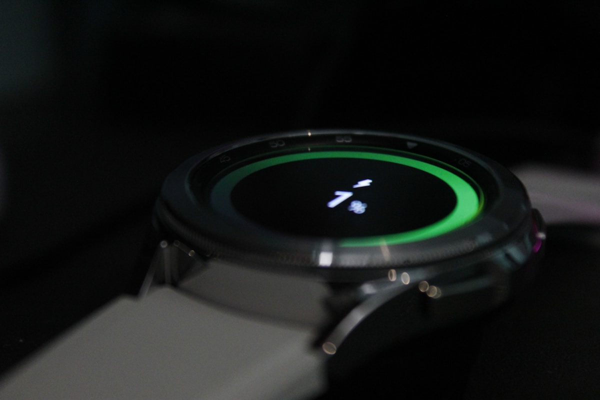 Close-up of a smartwatch with fitness tracking display, ideal for outdoor and trekking use